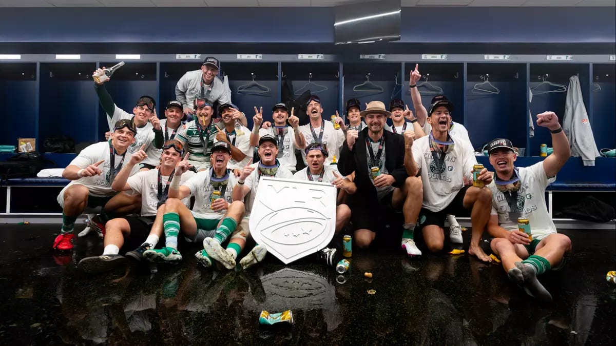 Chicago Hounds rugby players celebrating with champagne in locker room after championship victory