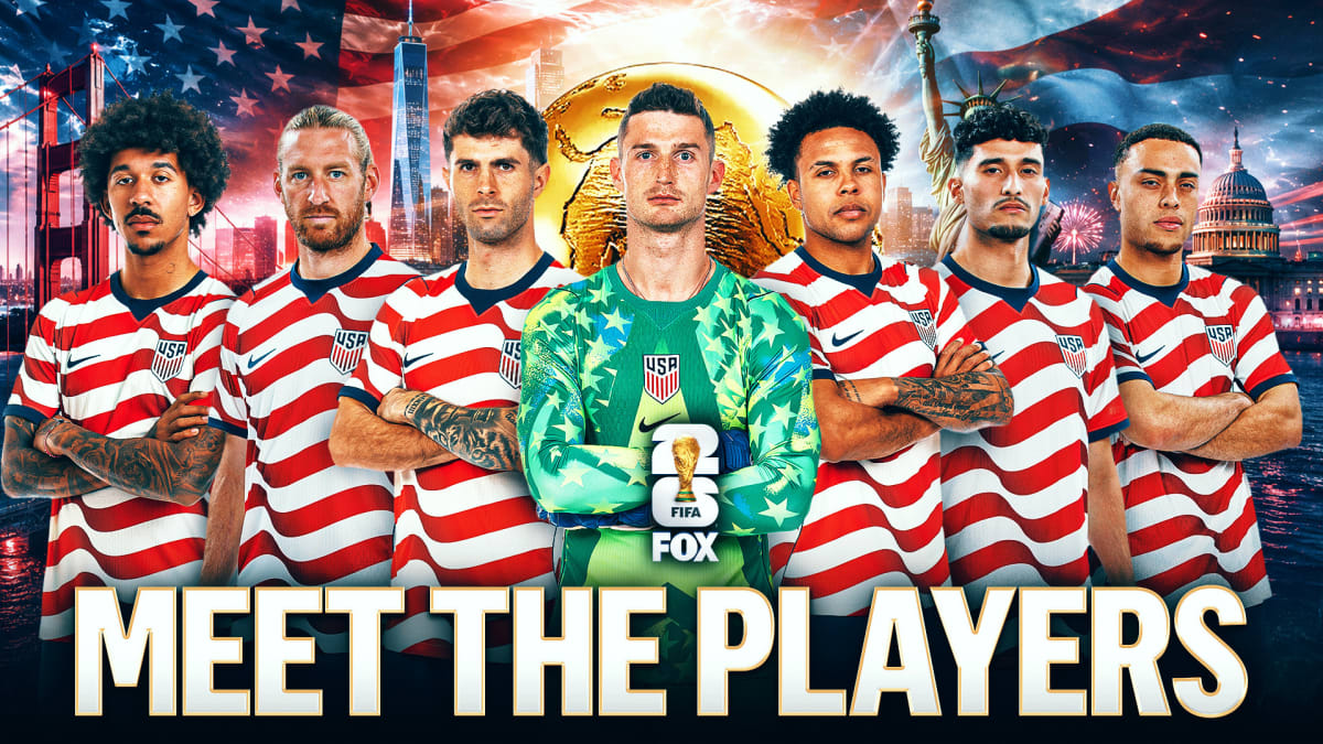USA men's national soccer team players celebrating together in red, white and blue uniforms