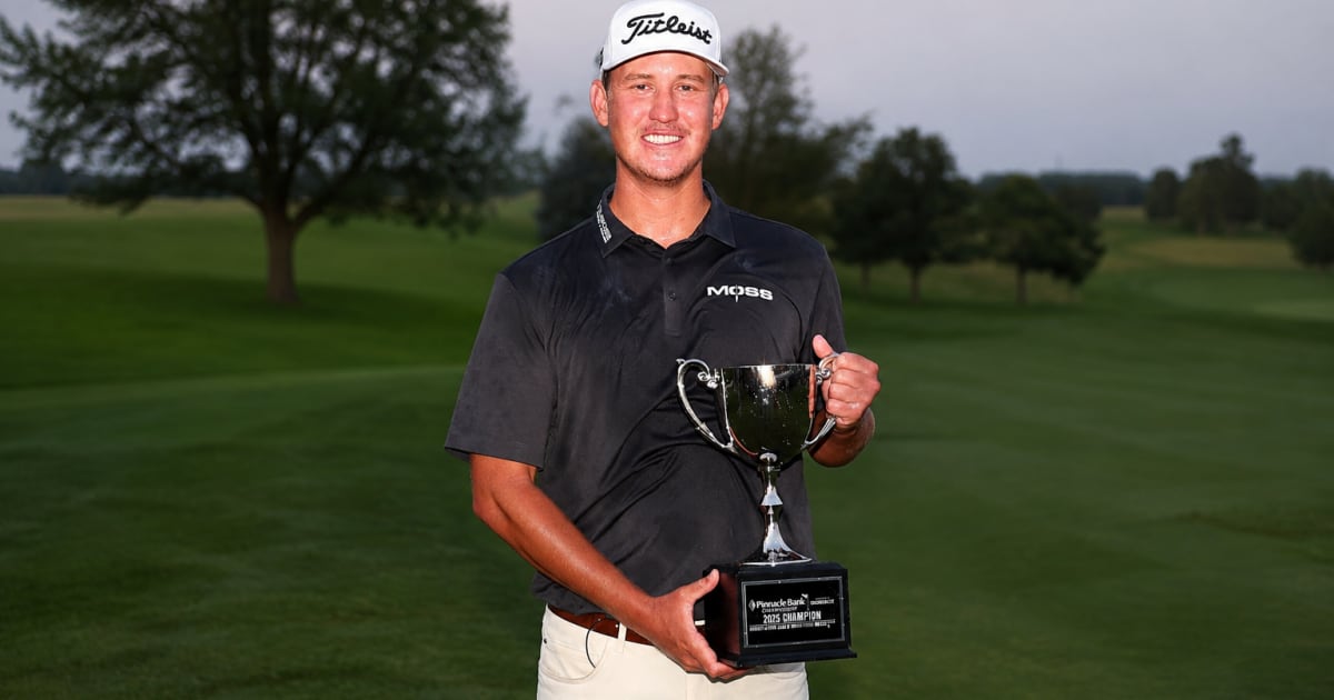 Professional golfer Frankie Harris celebrating victory at Pinnacle Bank Championship tournament