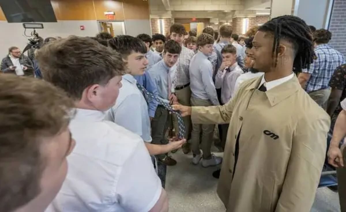 Buffalo Bills player Damar Hamlin speaking with Central Catholic High School students in Pittsburgh