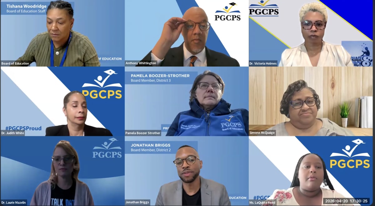 Elementary school students reading books together in a bright, modern classroom setting