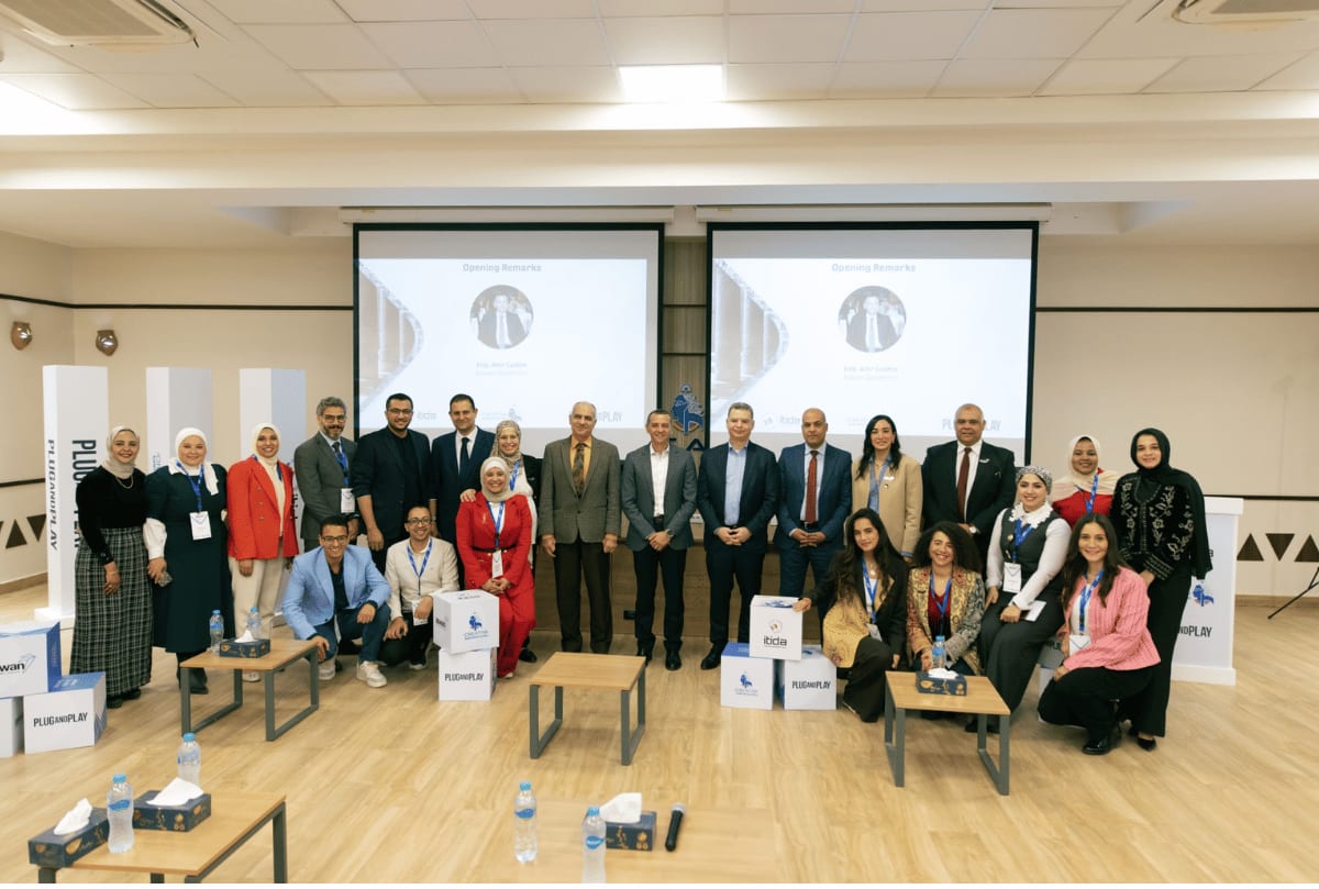 Entrepreneurs and officials gathering at Digital Egypt Innovation Hub in Aswan celebrating startup program graduation