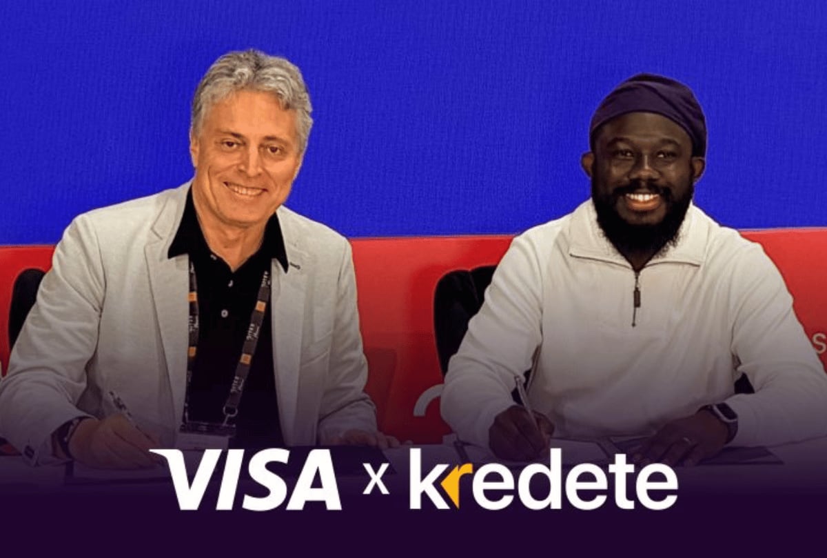 African entrepreneur presenting stablecoin Visa card technology at fintech innovation summit