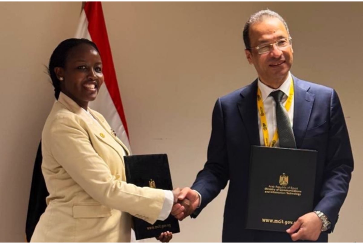 Rwanda and Egypt government officials signing digital partnership agreement at international summit