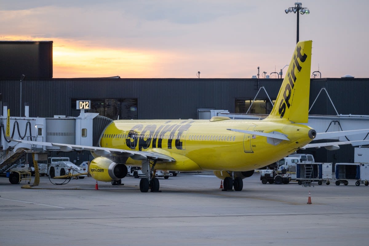 Young man speaking enthusiastically to camera in TikTok video about Spirit Airlines crowdfunding campaign