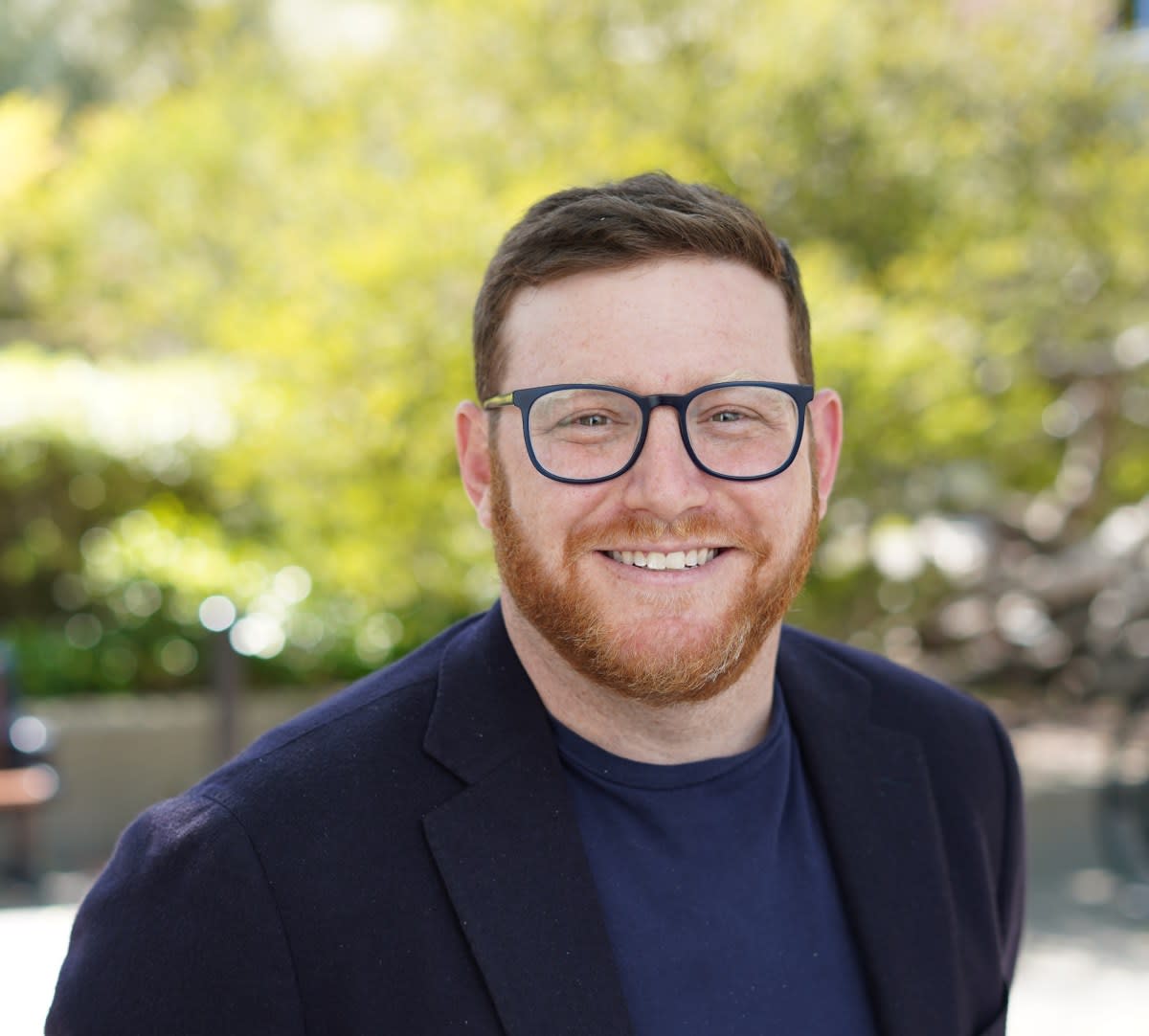 Entrepreneur Dylan Robbins celebrating successful venture capital funding for gaming startup Lucra Sports