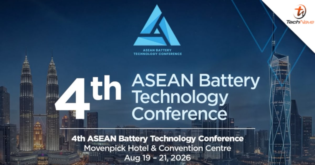 Modern convention center hosting battery technology conference with participants discussing clean energy innovations