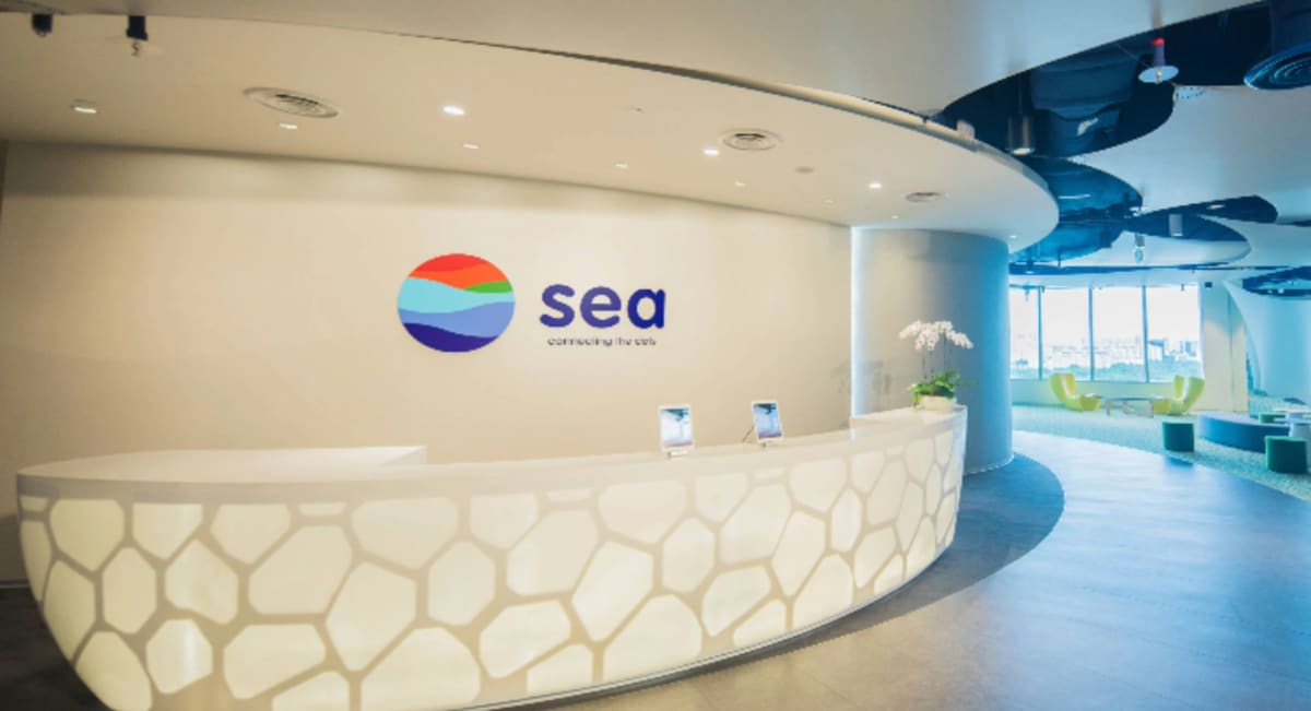 Modern office building in Singapore representing Sea Limited's new AI Center of Excellence creating tech jobs