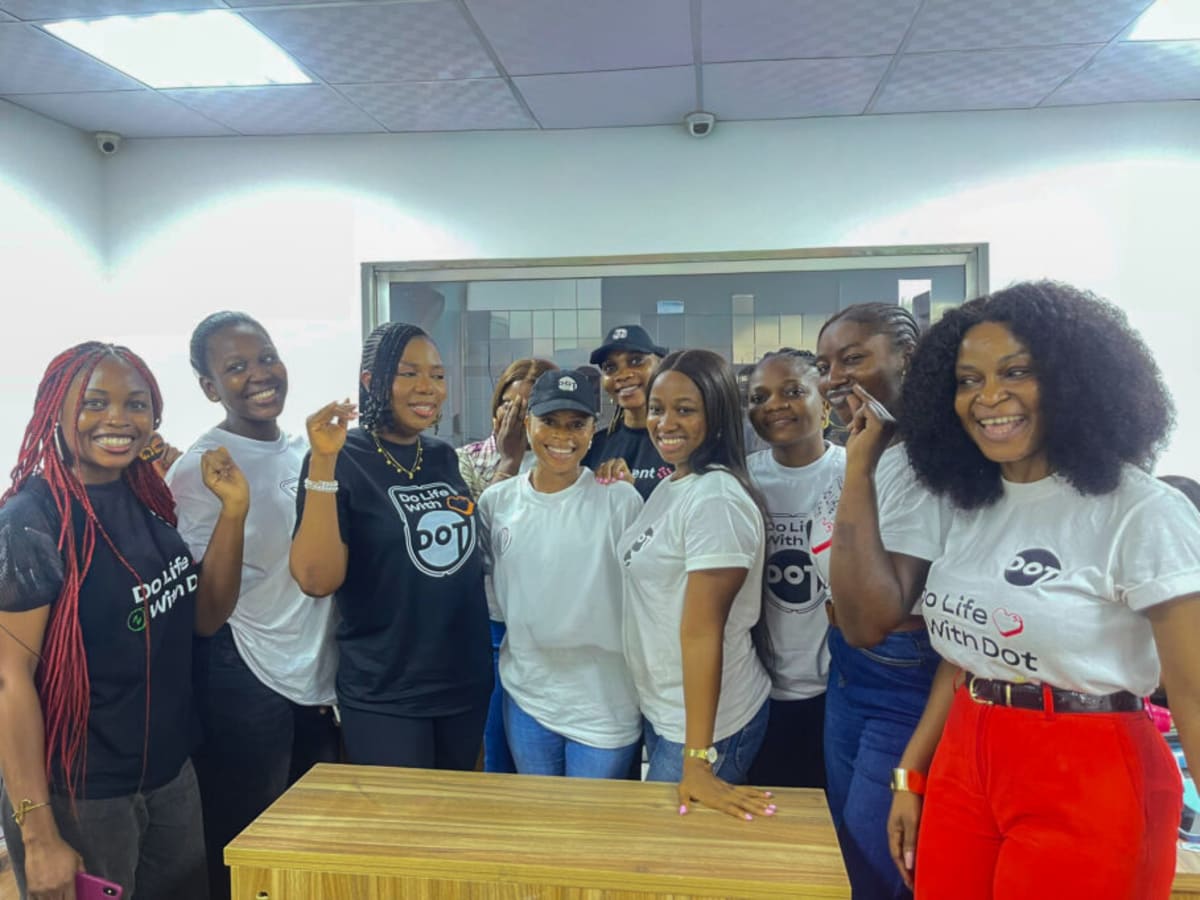 African women entrepreneurs working on laptops during virtual AI business training session