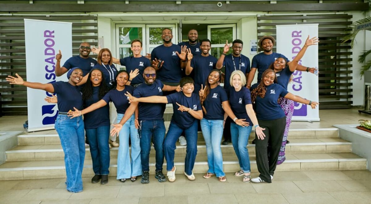 Nigerian entrepreneurs collaborating in modern workspace discussing business growth strategies and sustainable development plans