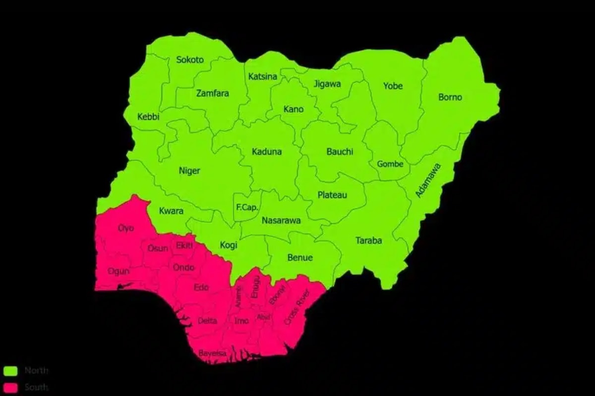 Developers collaborating at a technology event in Northern Nigeria, working on laptops