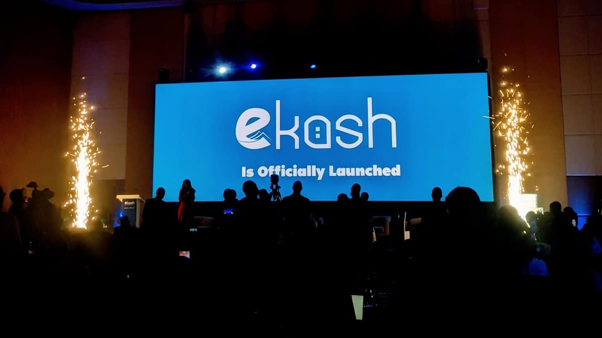 Digital payment transaction on mobile phone in Rwanda showing eKash platform