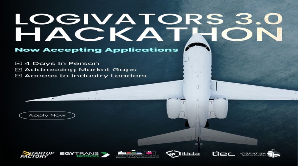 Young entrepreneurs collaborating at innovation hub workspace with laptops and planning materials in Egypt