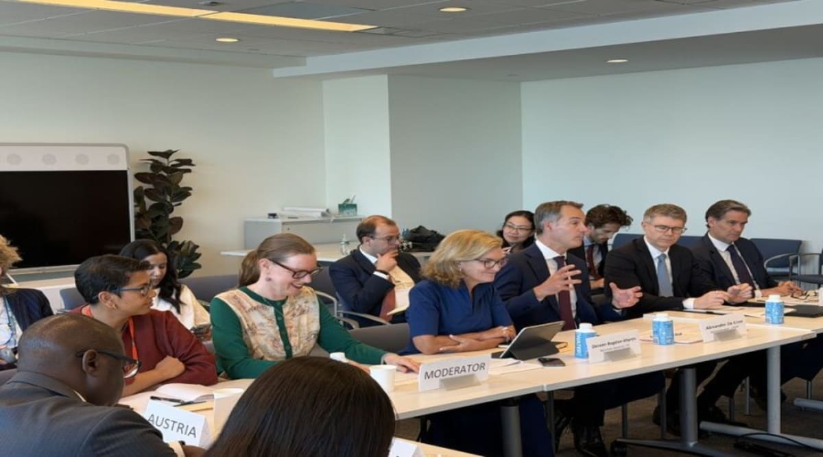 United Nations officials collaborating at briefing on global digital cooperation and technology access