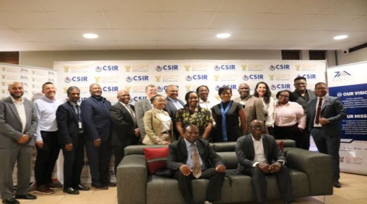 South African scientists and innovation leaders collaborating in modern conference room in Pretoria