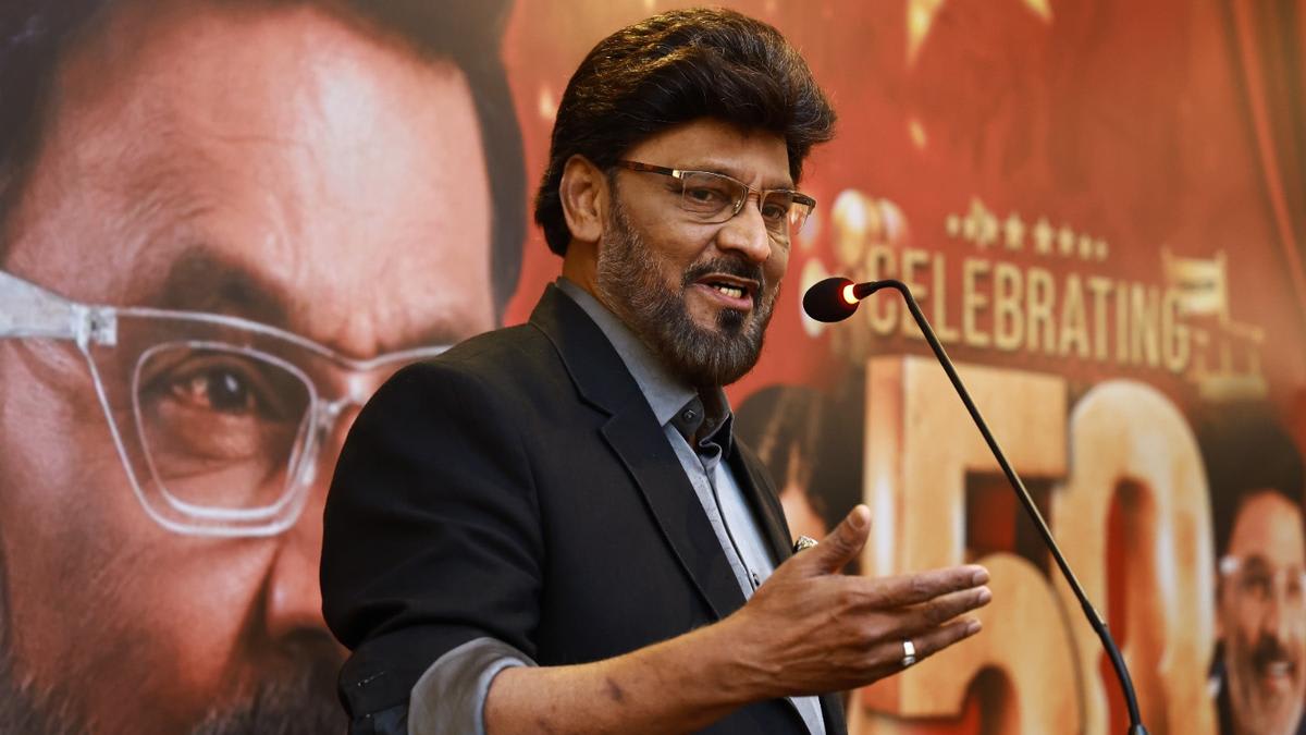 Veteran Tamil filmmaker K Bhagyaraj smiling at his 50-year cinema anniversary celebration event