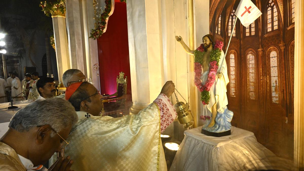 Worshippers in festive clothing gathering outside a church in Hyderabad for Easter Sunday services