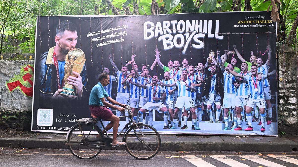 Massive Lionel Messi billboard towers over street decorations in Thiruvananthapuram, India for World Cup