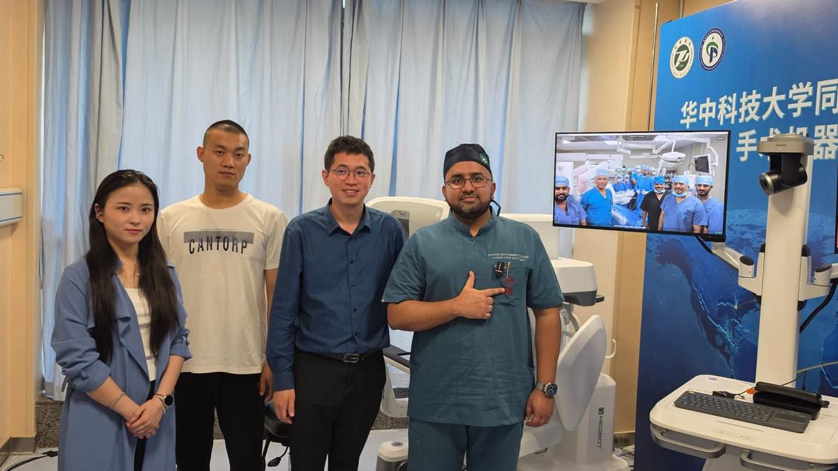 Surgeon operates robotic surgical console remotely from hospital in Wuhan, China