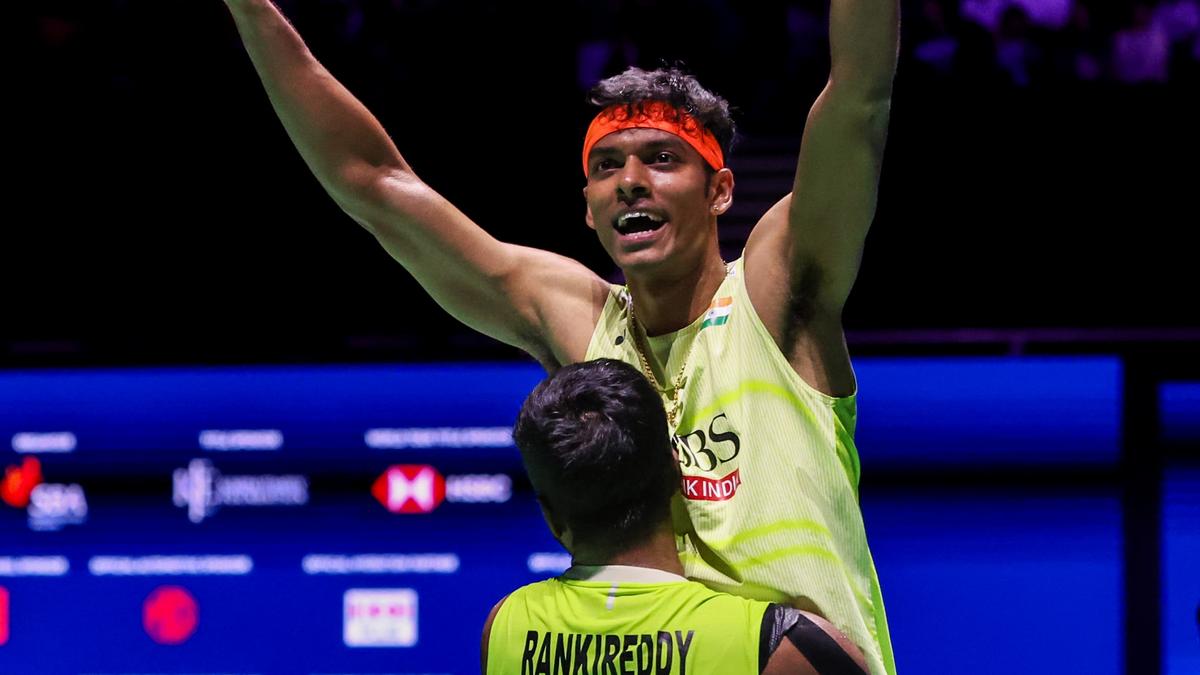 Indian badminton players Satwiksairaj Rankireddy and Chirag Shetty celebrating their historic Singapore Open victory