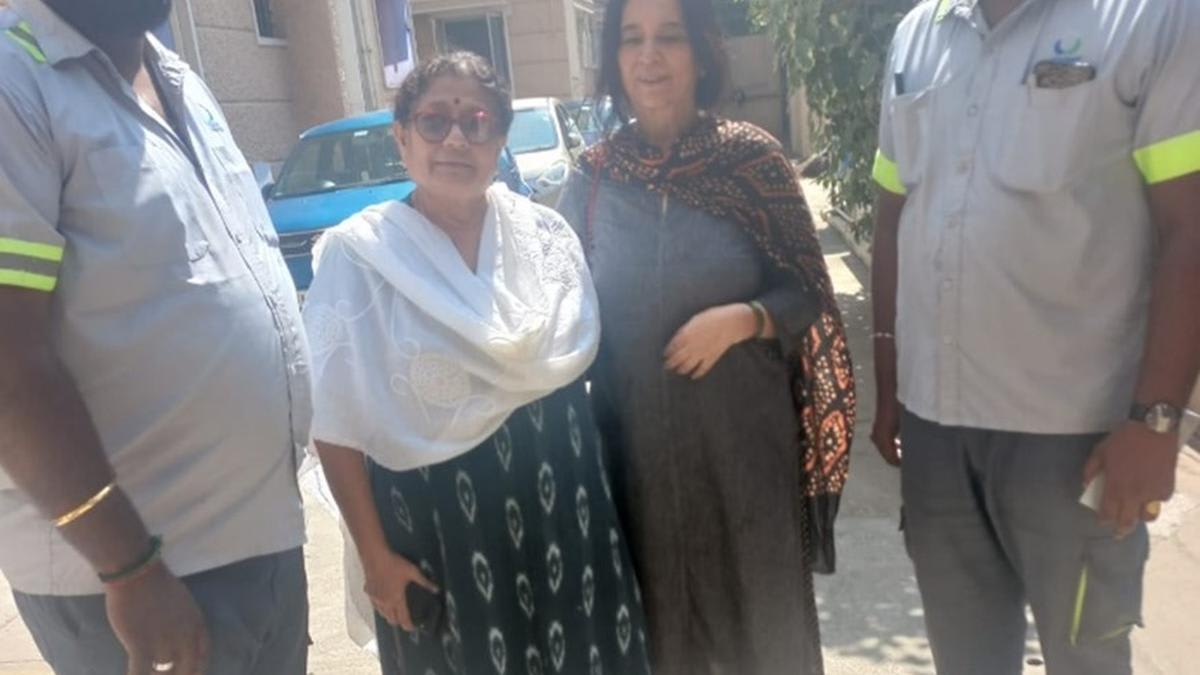 Chennai neighborhood residents teaching waste segregation through community door-to-door campaign