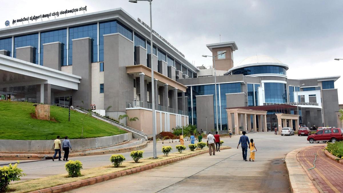Modern hospital building in Mysuru, India, where cardiac care expansion will serve thousands