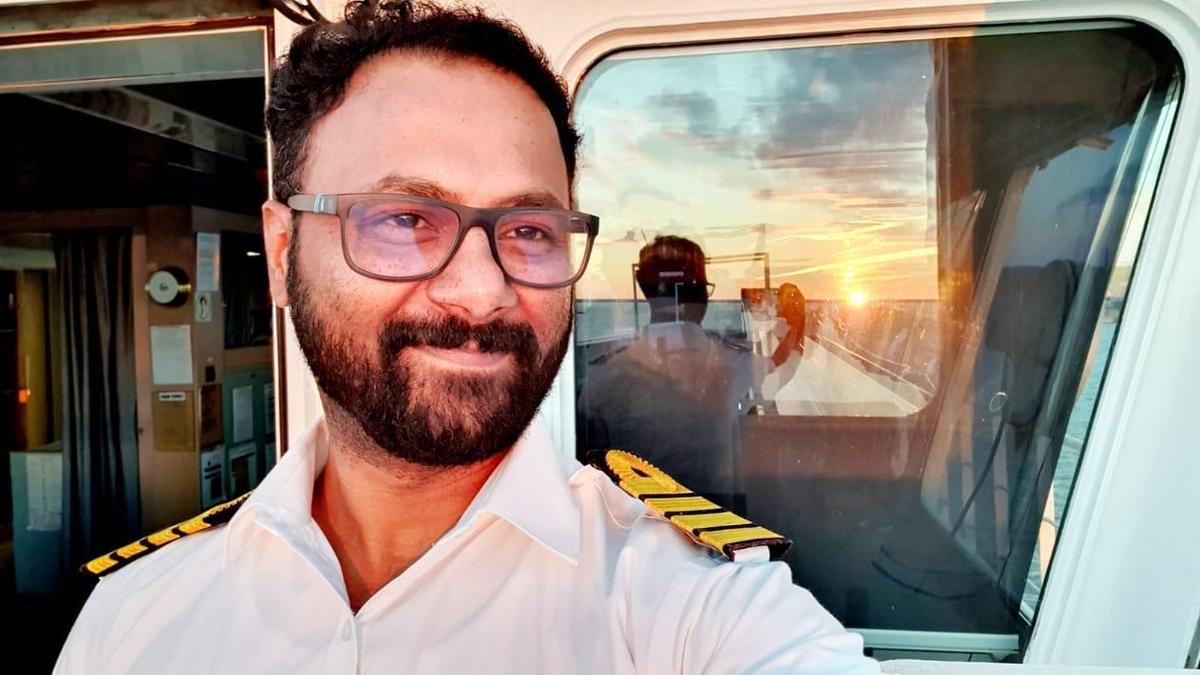 Indian sailor Sanu Jose smiling after international tribunal clears him of false charges