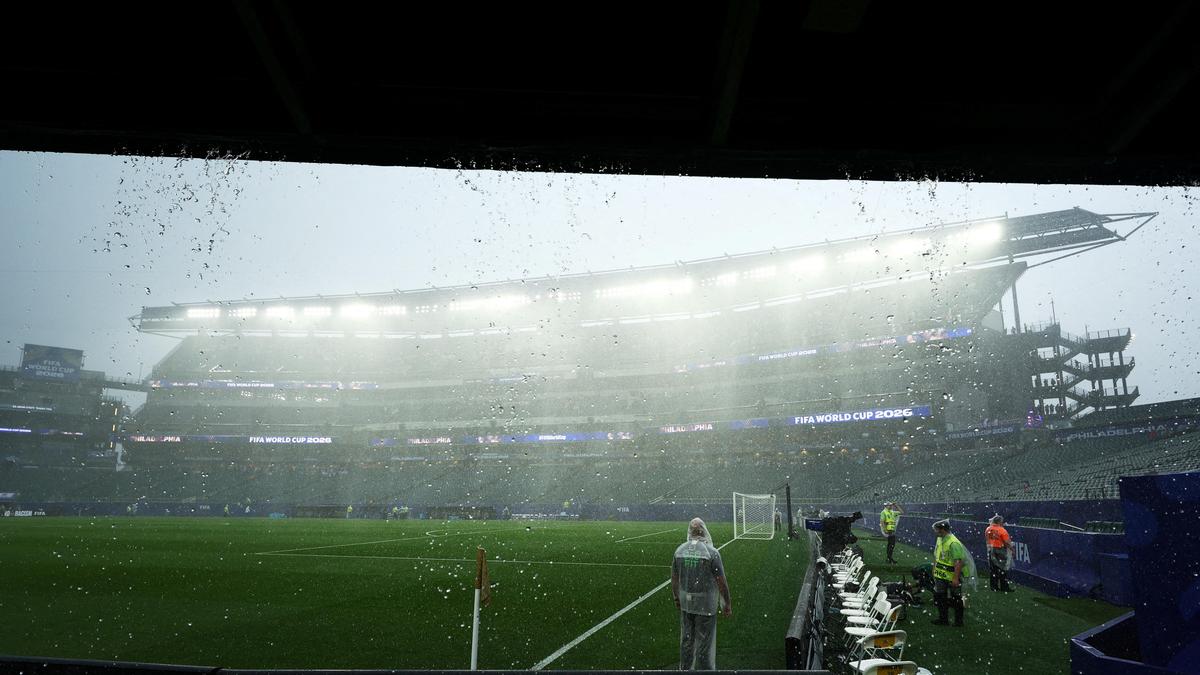 Soccer players reviewing tactical data on digital screens during 2026 FIFA World Cup