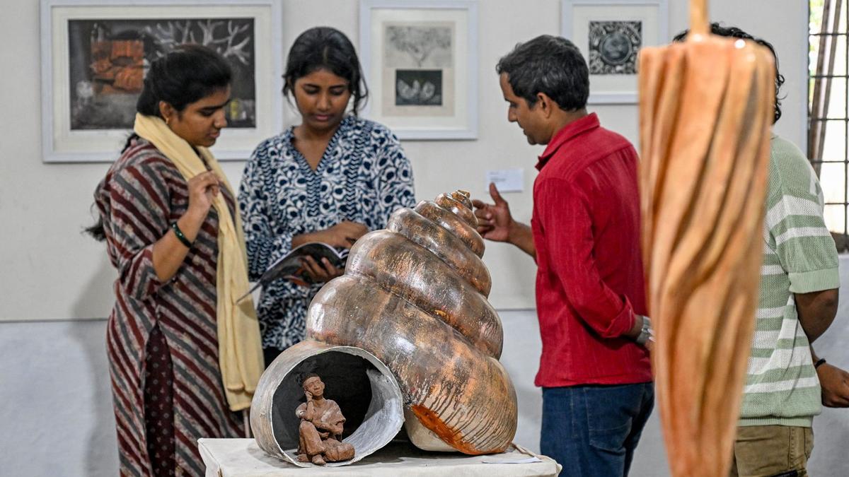 Straw and clay installation artwork created by fine arts student at Andhra University exhibition