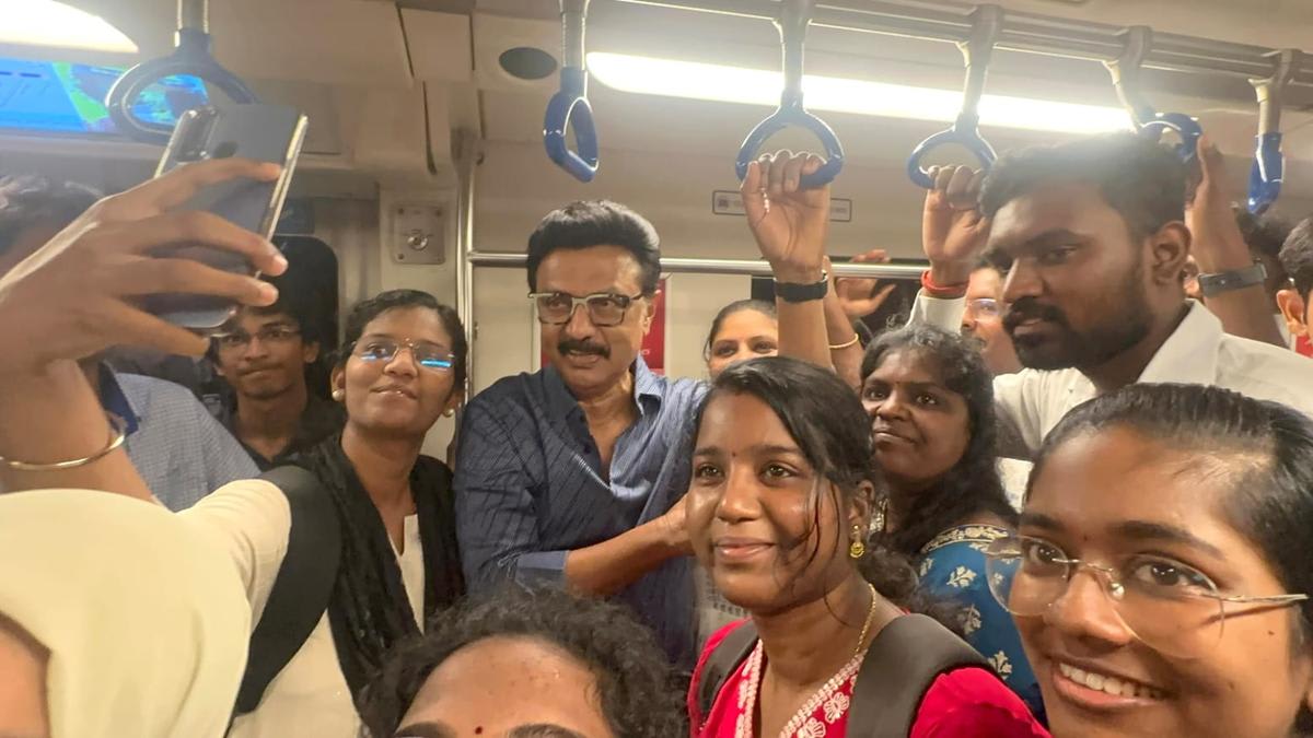 Tamil Nadu Chief Minister M.K. Stalin talking with passengers on Chennai Metro train