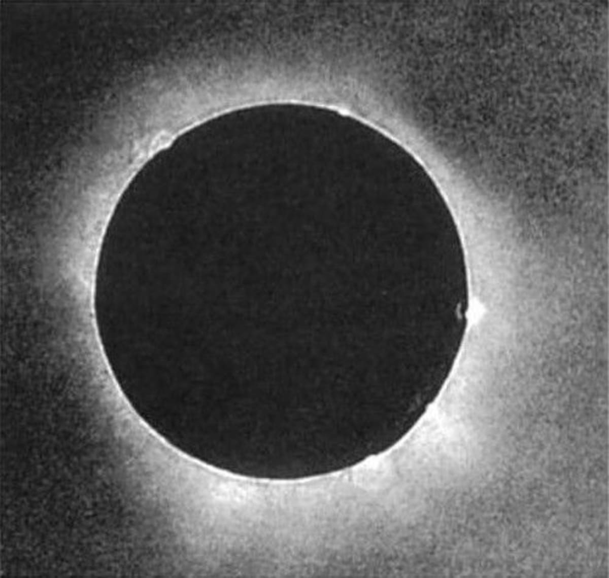 First daguerreotype photograph of total solar eclipse showing moon blocking sun's bright disk