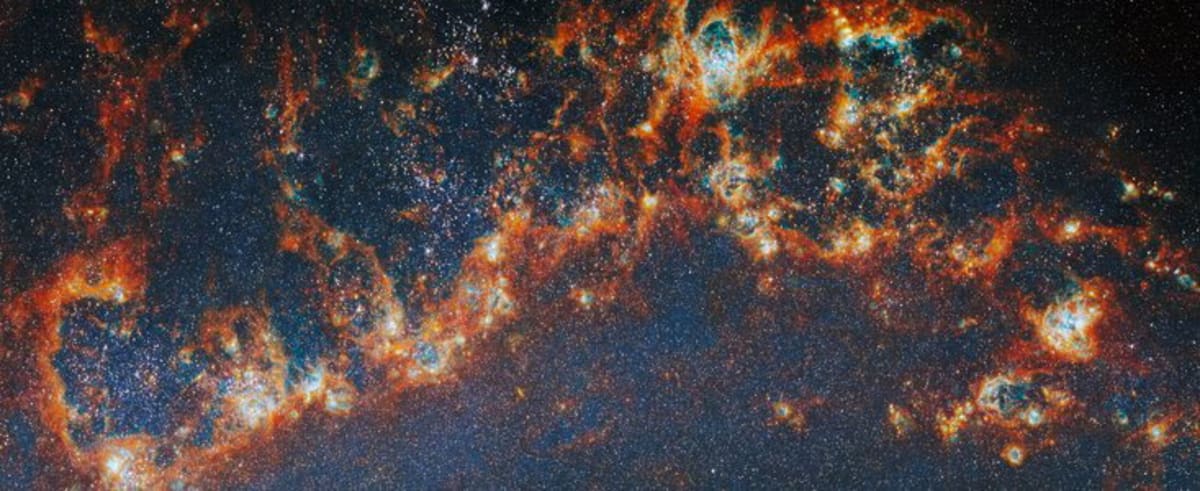 James Webb Space Telescope captures colorful star clusters emerging from cosmic gas clouds