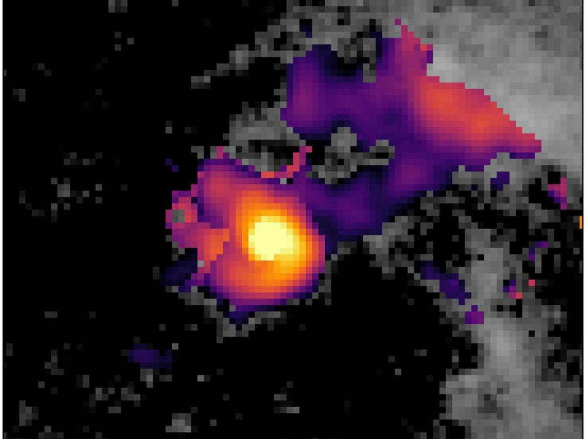 Artist rendering of gas filaments feeding a supermassive black hole's spinning accretion disk