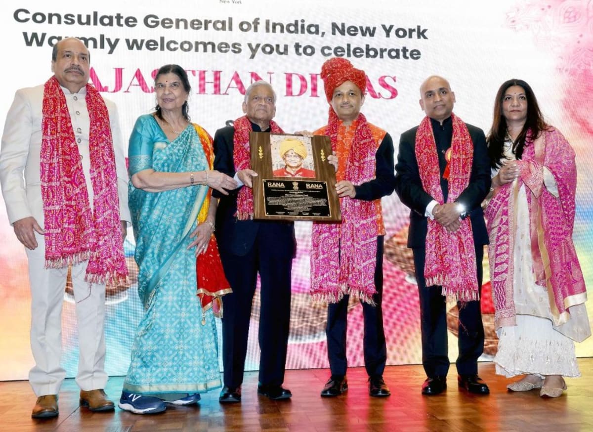 Exterior of modern Bharatiya Learning Center building in Chalfont, Pennsylvania with attendees gathering for opening ceremony