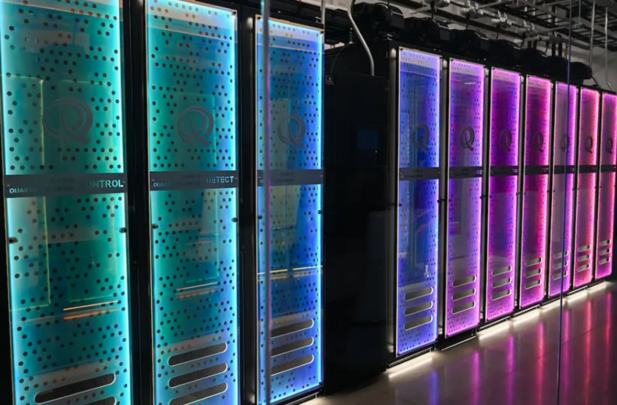 ** University students working with advanced quantum computing equipment in modern Tennessee laboratory facility