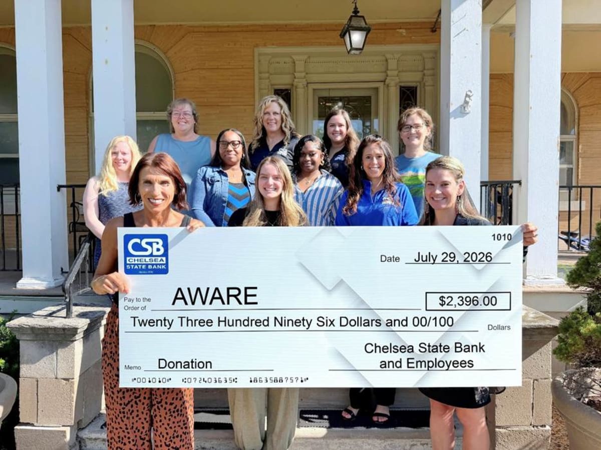 Bank Employees Raise $2,396 for Domestic Violence Shelter