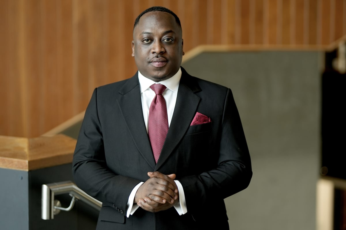 Samuel Obiri Yeboah, Ghanaian student leader, smiling in professional attire representing UK students