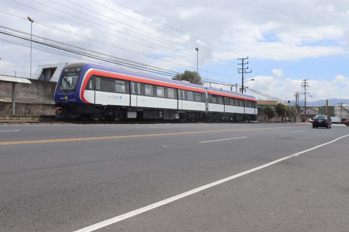 Costa Rican passenger train at station platform ready to transport Romería pilgrims
