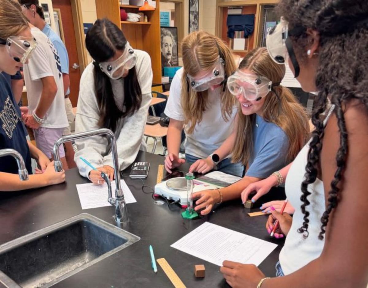 Students in AP Chemistry class conducting laboratory experiment at Thomas County Central High School