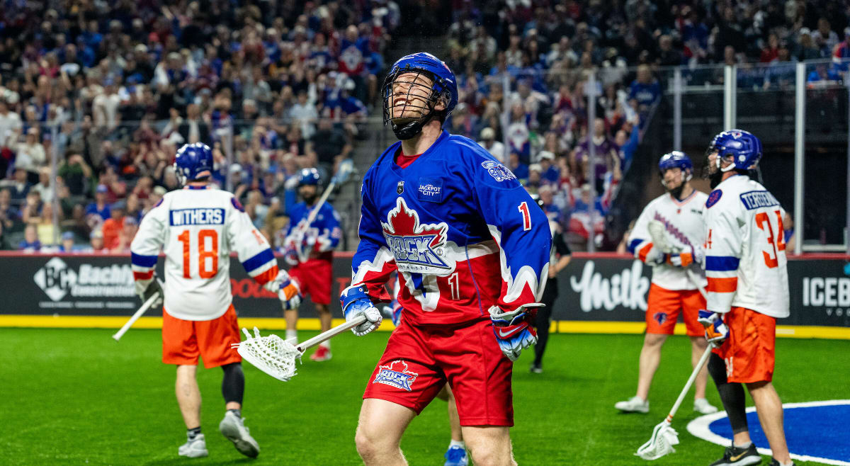 Toronto Rock lacrosse players celebrating goal during comeback victory in NLL Finals Game 1