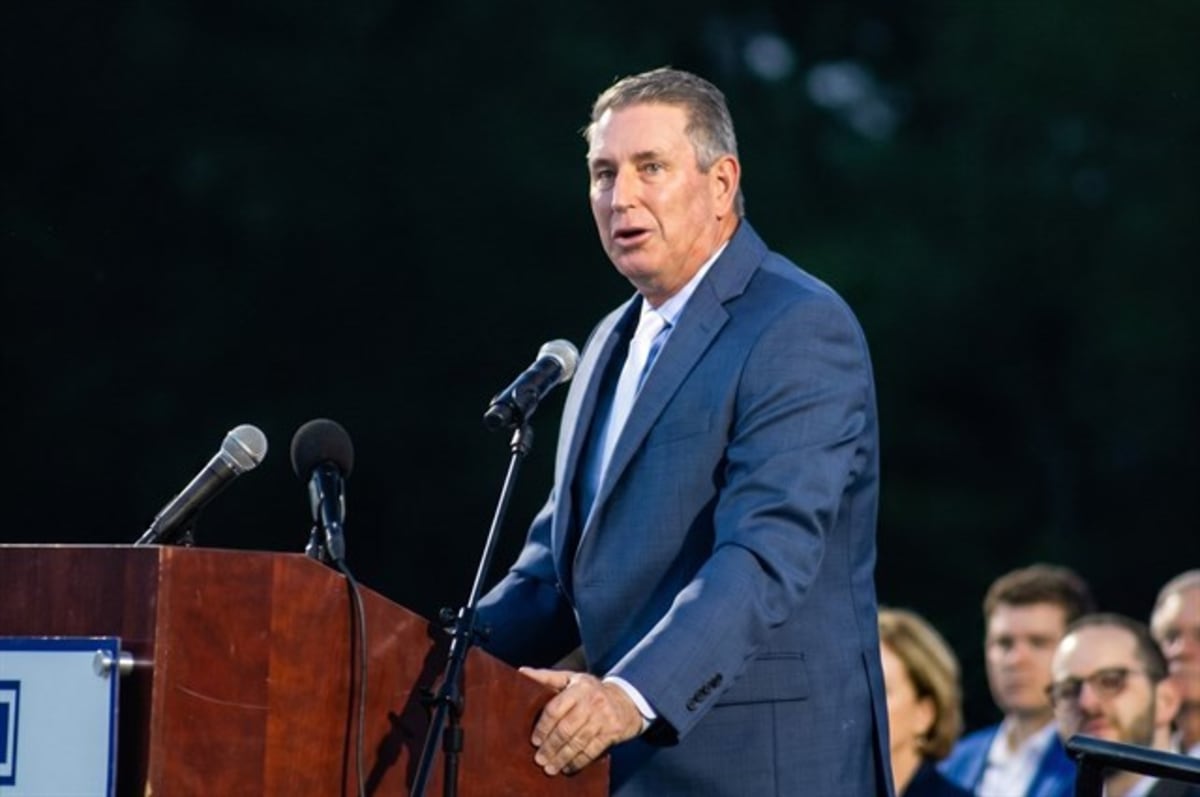 Lindale ISD superintendent addressing students at school district graduation ceremony