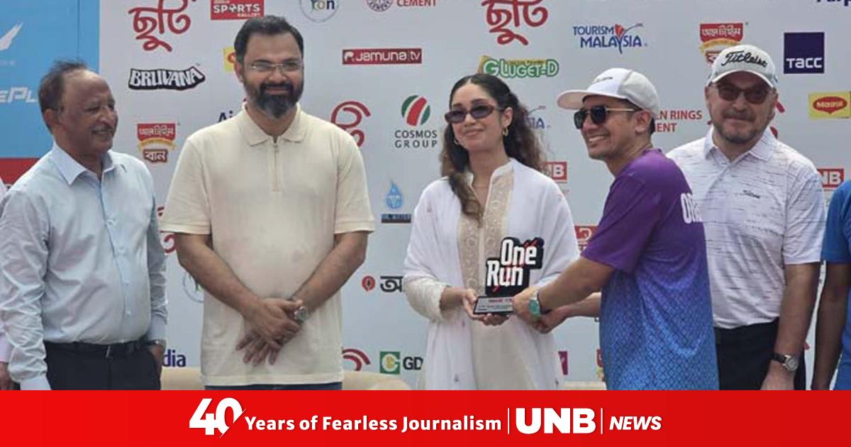 Diverse group of runners participating in One Run 2026 marathon around Hatirjheel Lake in Dhaka