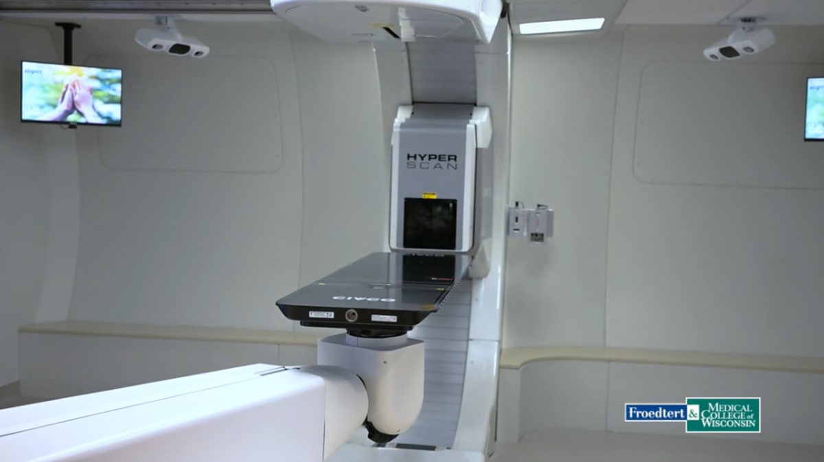 Large proton therapy machine in medical facility ready to treat cancer patients with precision radiation