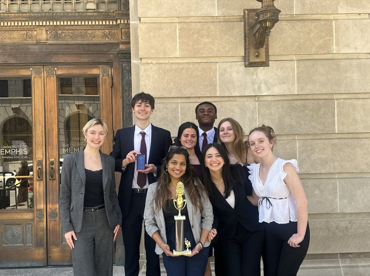 Vanderbilt mock trial A Team members celebrate with trophy after qualifying for nationals in Memphis