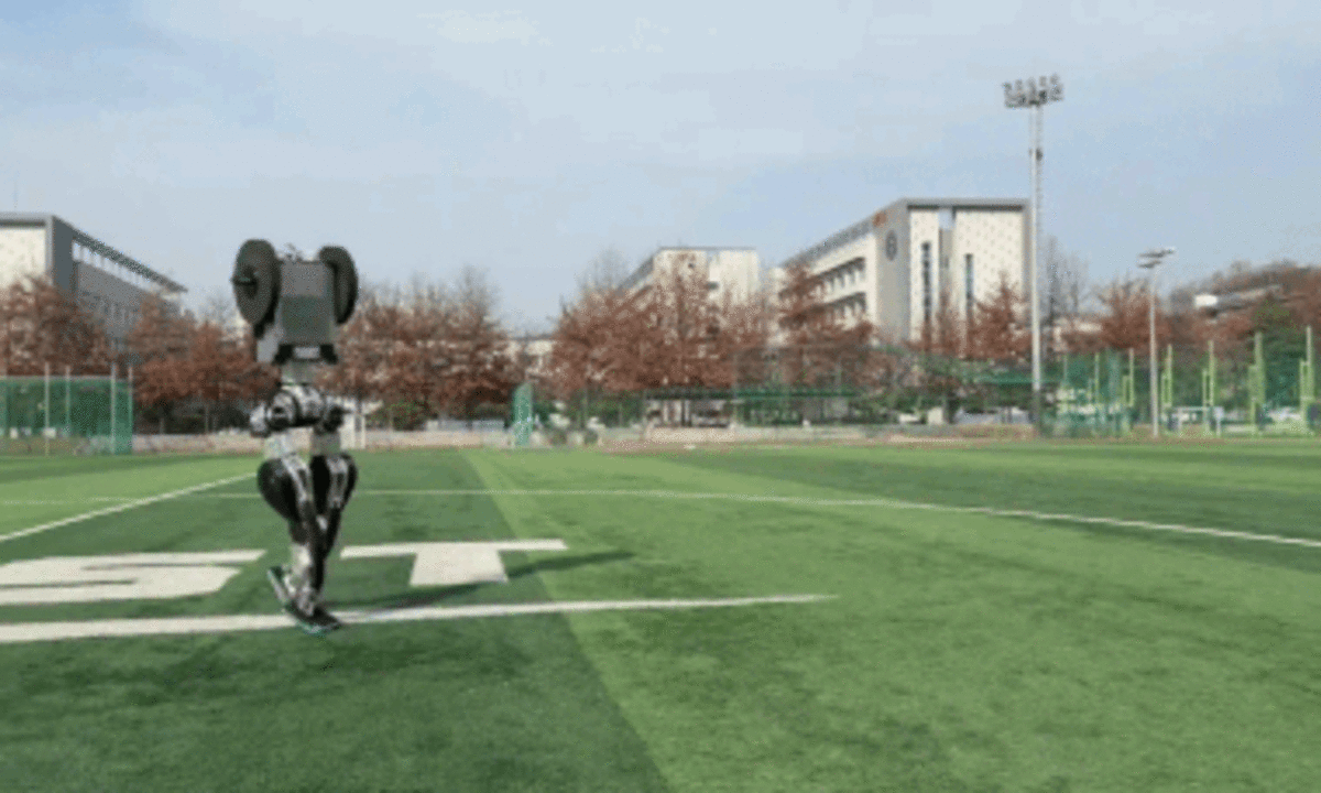 South Korean humanoid robot v0.7 performing a moonwalk in a laboratory setting