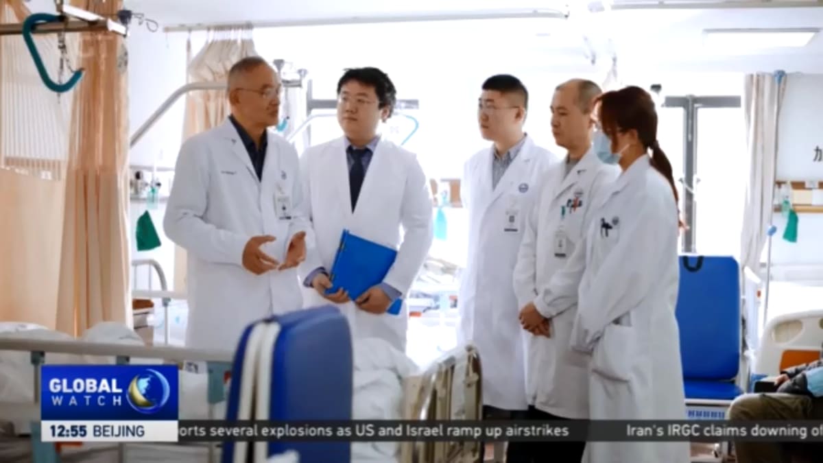 Advanced white polymer knee joint prosthesis displayed in medical laboratory setting in Shanghai