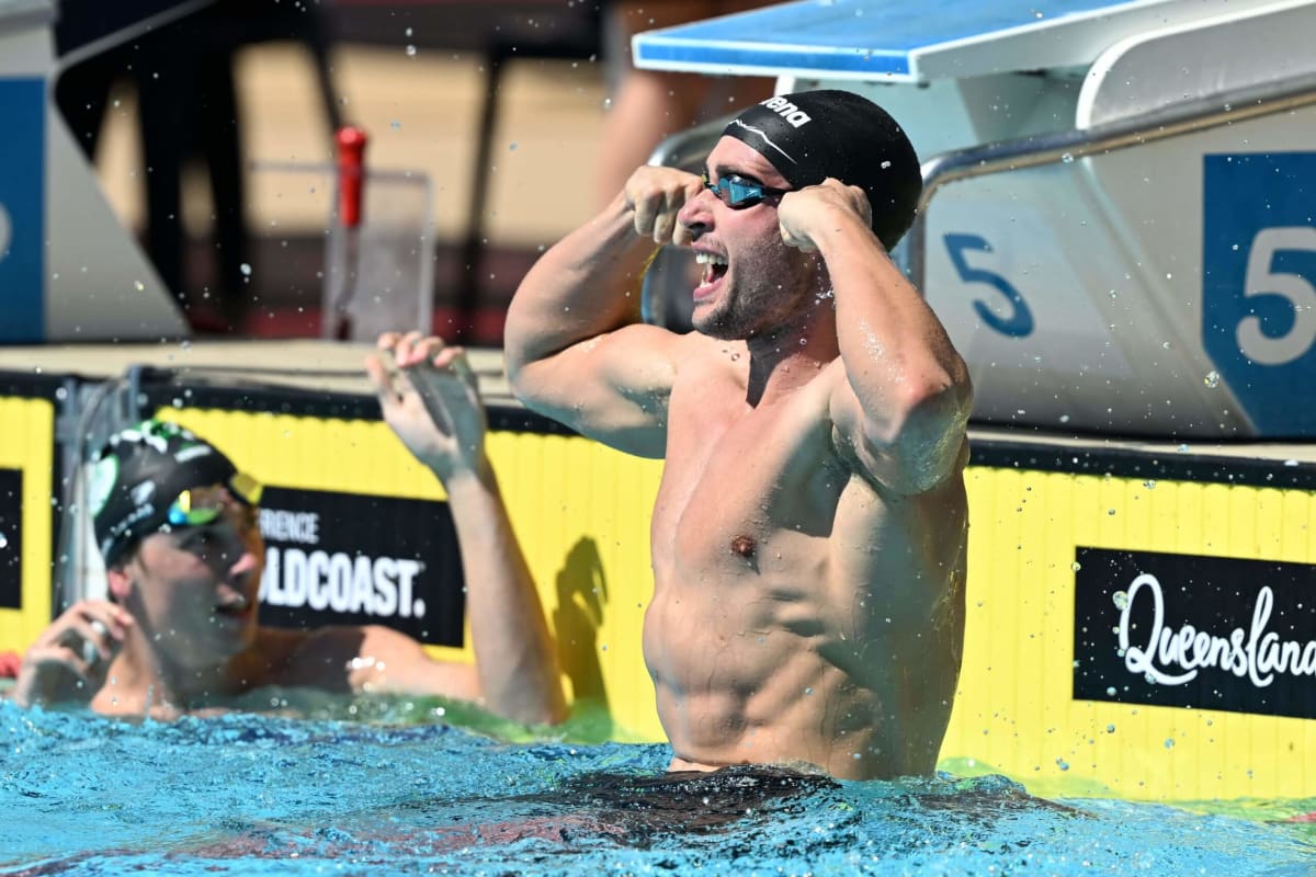 Benny Hance celebrates poolside after breaking his 50-meter freestyle world record in Australia