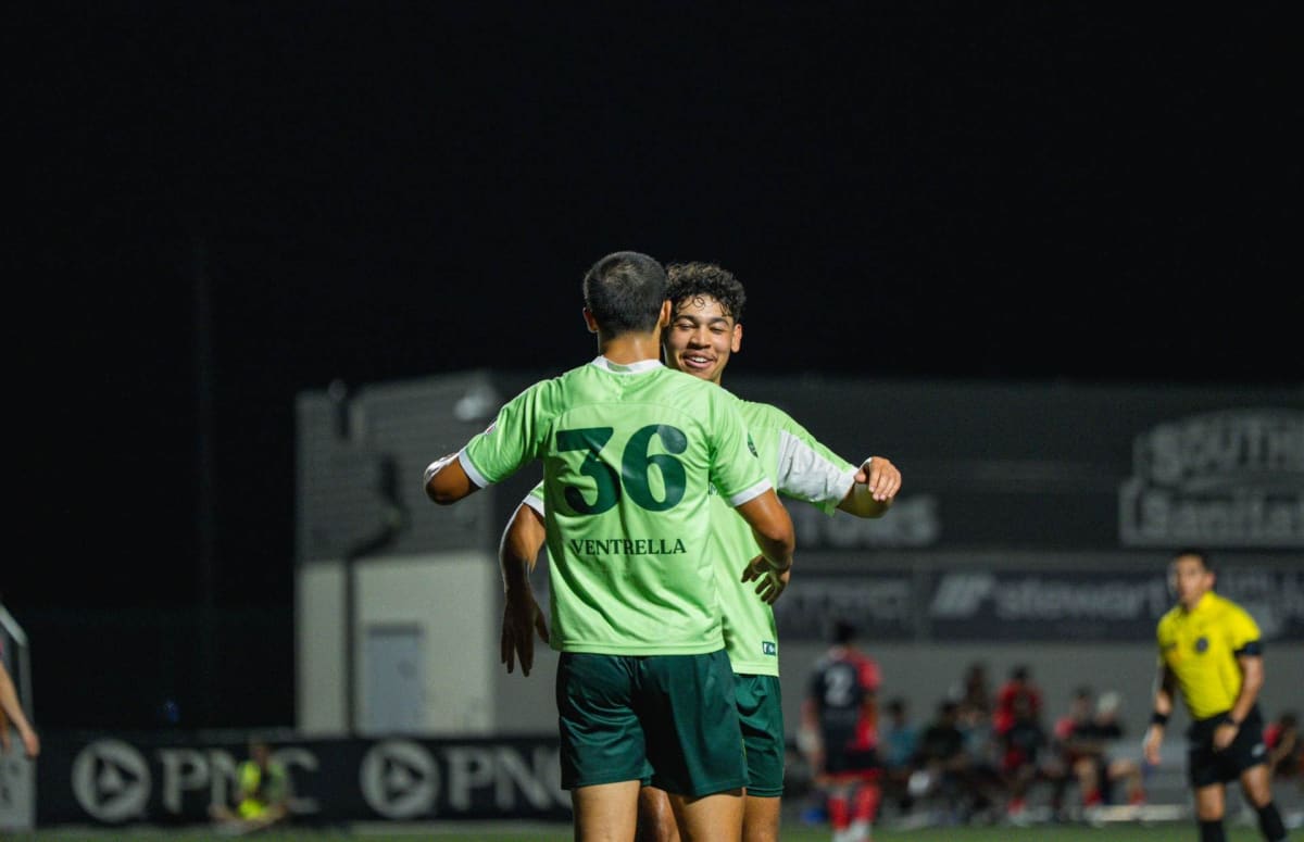 Vermont Green FC men's soccer team celebrates after defeating Laredo Heat 7-1 to reach championship final