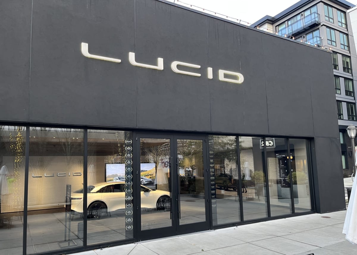 Modern Lucid electric vehicle showroom in Seattle's University Village shopping center with cars on display