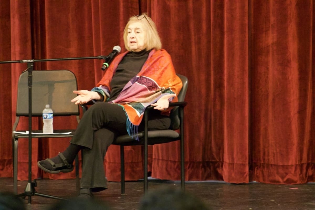 Holocaust survivor Kati Preston speaking to students at Wayland High School auditorium